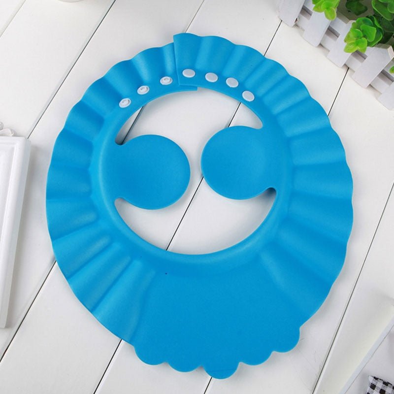 Visière chapeau pour douche bébé I ShampooCap™ - Plaisirs de bebe